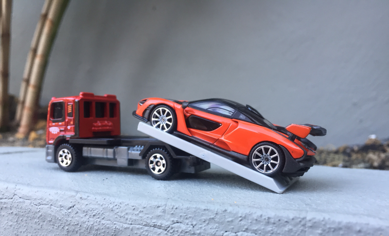 Illustration for article titled McLaren Monday - Mira Orange delivery with Matchbox Flatbed King!